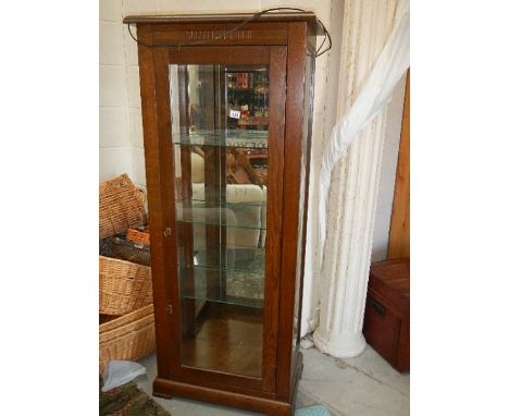 A mahogany 4 shelf cabinet.