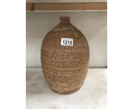An art pottery lamp base embossed RH