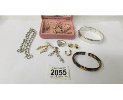 A Vintage silver bangle, a silver curb bracelet and a quantity of earrings etc., in yellow metal.