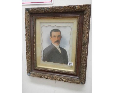 An early 20th century portrait of a man in original frame.