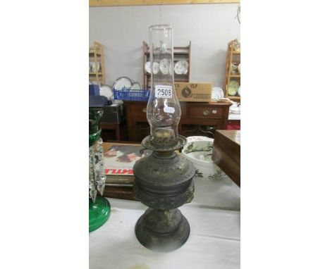 A Victorian oil lamp.