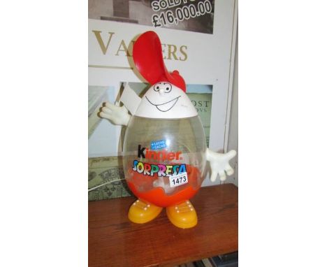 A vintage Kinder Surprise advertising point of sale egg dispenser converted to a lamp (unchecked), 43 cm tall.
