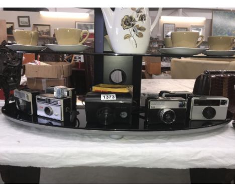 7 Kodak 126 instamatic cameras varying in age