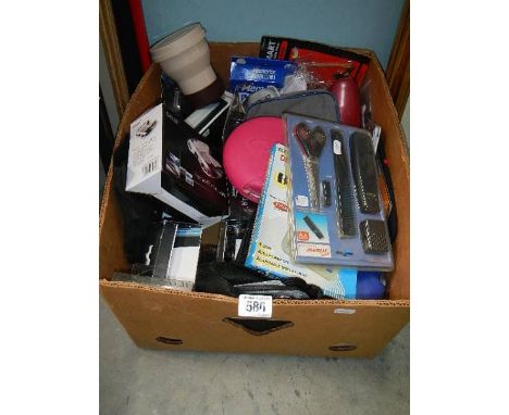 A box of assorted gadgets including radio, binoculars, camera etc.,