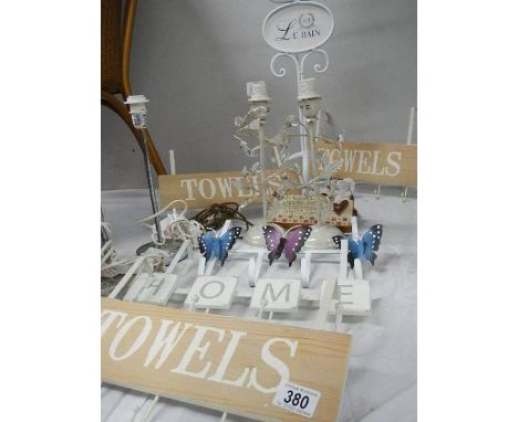 A mixed lot of bathroom and other items including towel holders, toilet roll holder, lamp bases etc.,