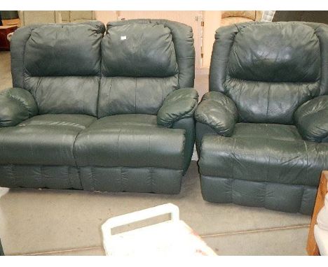 A green leather 2 seat sofa and chair.