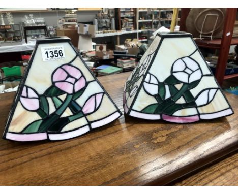 A pair of leaded Tiffany style glass lamp shades (20cm x 20cm by 15.5cm high)