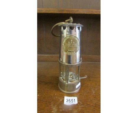 An original Eccles brass miners M &amp; O safety lamp by The Protector Lamp &amp; Lighting Co., Ltd., type 6.