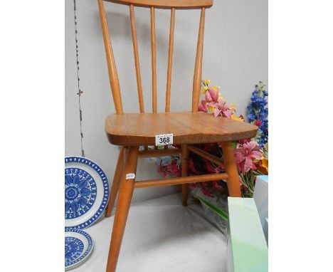 An Ercol dining chair.