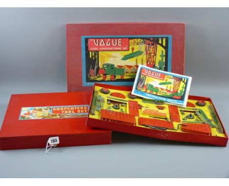 A VOGUE STEEL CONSTRUCTION SET, set no. 3 Major, unused in original box (slightly damp effected contents) with a vintage wood