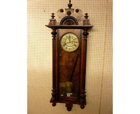 A VIENNA STYLE WALL CLOCK, late 19th Century walnut and ebonized wall clock, twin weight pendulum driven movement striking on