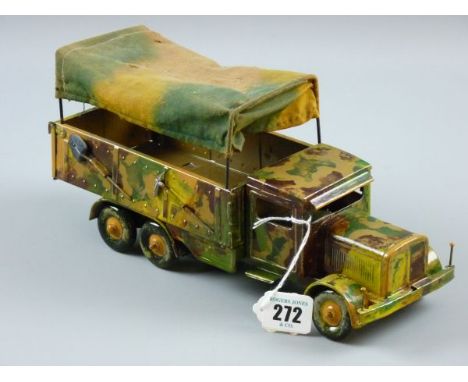 A CLOCKWORK ARMY TRUCK, a tinplate model in repainted livery with Dunlop balloon tyres and canvas canopy, 27 cms length, prob