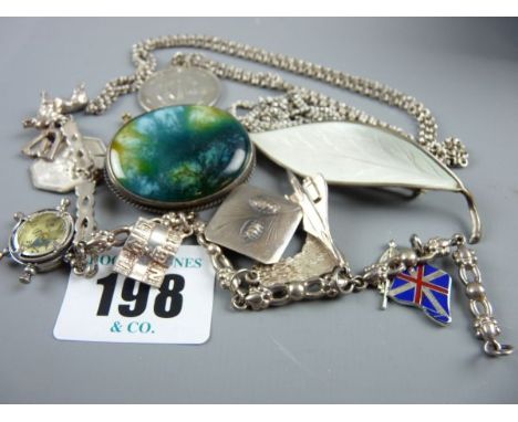 A NORWEGIAN STERLING SILVER AND WHITE ENAMEL LEAF BROOCH, an oval silver and green mineral brooch by Charles Horner (crack to