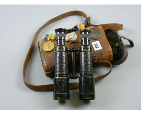 DOLLOND, LONDON MILITARY BINOCULARS, a leather cased pair, black lacquered brass stamped Dollond London with broad arrow mark