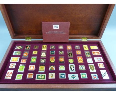 REGIMENTAL TABLETS, a cased set of fifty Franklin Mint enamel and non precious metal regimental tablets 'The World's Greatest