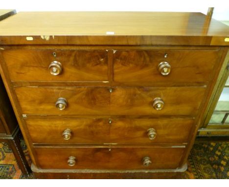 A VICTORIAN MAHOGANY CHEST of two short over three long drawers with turned rosewood and mother of pearl button knobs, rounde