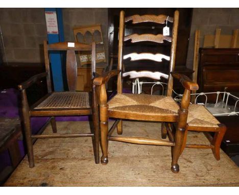 An early to mid 20th century childs ladder back carver chair and stool, both with rush seats, plus a similar period childs ca