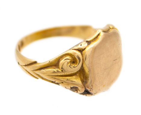 An 18ct hallmarked gold and 9ct shield front gentleman's signet ring.  The shield is a replacement and tests as 9ct, the shou