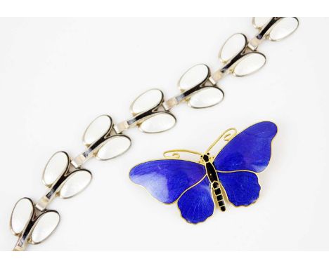 A Sporrong & Co Stockholm enamel butterfly brooch and a silver and enamel Scandinavian bracelet. The gilt metal butterfly in 