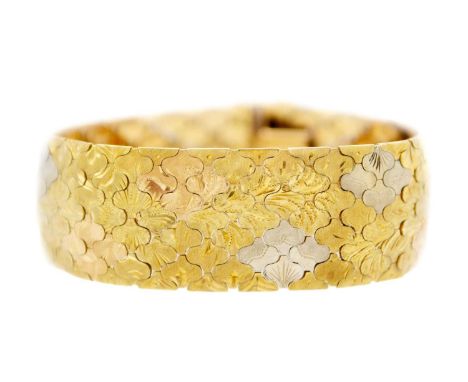 An Italian 18ct bi-colour articulated bracelet. With foliate engraved and engine turned decoration, stamped 98VI 750 MAR BREV