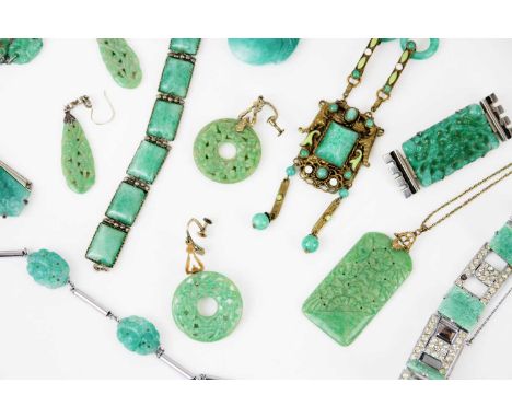 A group of Art Deco imitation jade costume jewellery. Including five necklaces, two bracelets, a brooch, a pendant and two pa