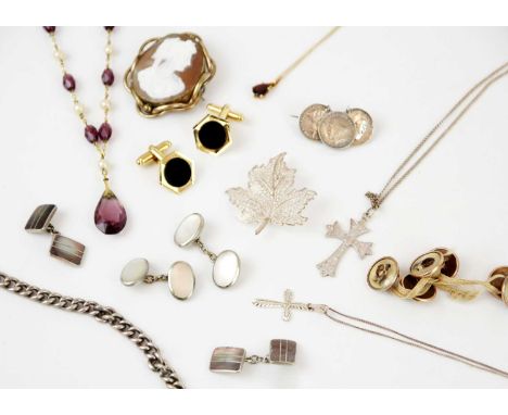 A selection of costume jewellery. Including a 9ct garnet set pendant on a fine 9ct necklace, 1.6g; a silver curb link graduat