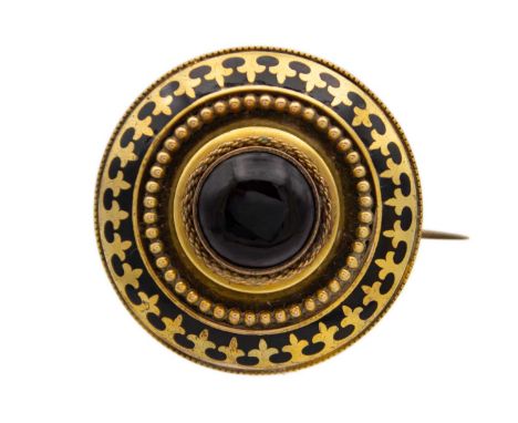 A Victorian gold and black enamel Etruscan Revival memorial brooch set with banded agate. The back with glazed locket panel, 