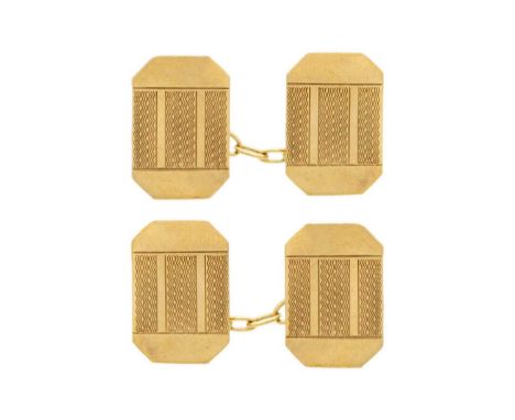 A 9ct pair of engine turned cufflinks. Stamped 9ct, together with a little scrap gold, total weight 3.5g.