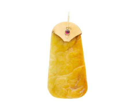 A carved russet jade pendant with 9ct mount and cabochon garnet set bale. The jade carved with pad leaves and a fish, the gol