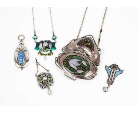 A selection of five Art Nouveau silver and enamel pendants. One is a pendant necklace set with mother of pearl and a baroque 