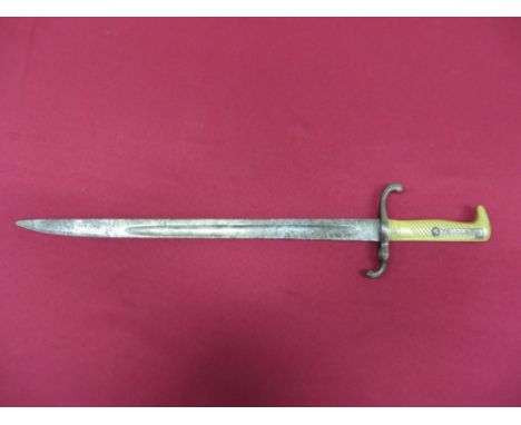 18 inch single edged blade with large fuller (back edge re-sharpened).  The forte marked “Coulanx & Co Klingenthal”.  Back ed
