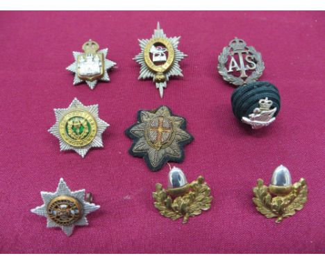 consisting silvered, gilt and enamel Irish Guards forage cap badge (lugs) ... Silvered and gilt Worcestershire Reg by “Gaunt”