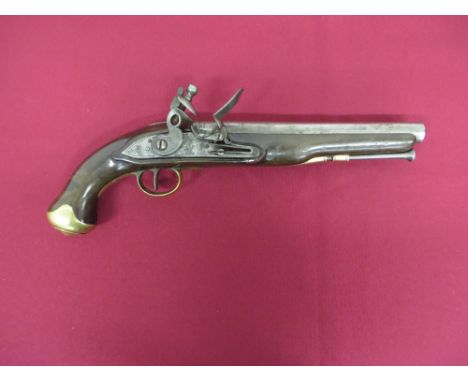 16 bore, 9 1/4 inch smoothbore barrel. Breech with proof stamps. Lock plate with line edge engraving. Central rampant East In