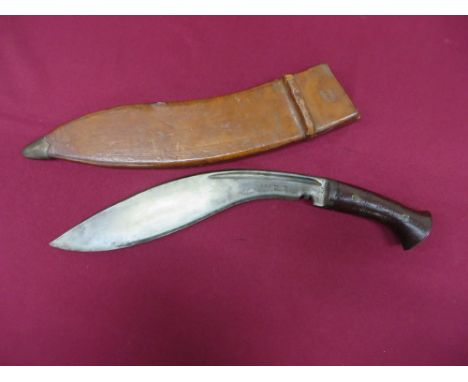 13 inch, single edged blade of typical form. Narrow back edge fuller. Blade stamped “943 Pioneer Calcutta”. Steel ferrule and