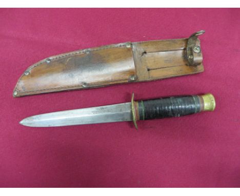 6 1/4 inch double edged blade marked “Southern &amp; Richardson Sheffield England”. Brass oval crossguard and pommel. Leather