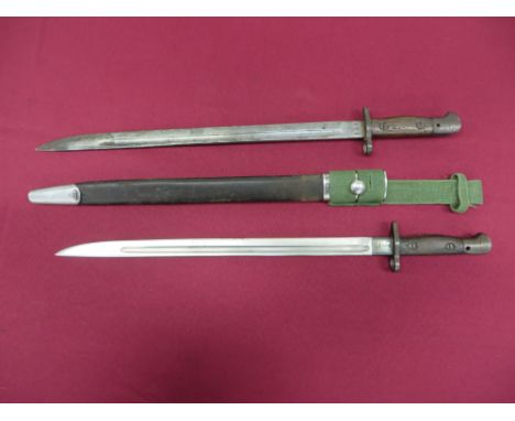 consisting a WW1 dated example.  Single edged blade with central fuller.  The forte with maker “Sanderson” dated “1/18”.  Ste