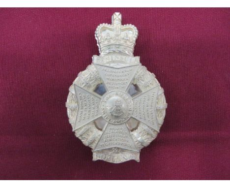 QC laurel wreath with battle honours and lower battle honour “Normandy”. Central cross with battle honours to each arm. Centr