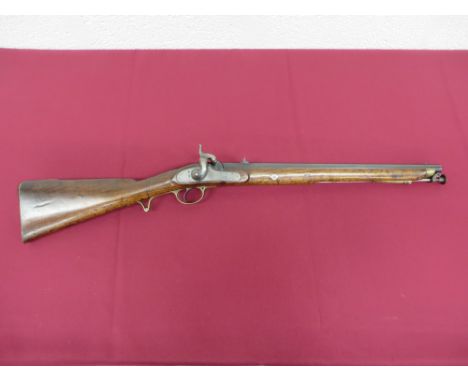 .650 rifled 20 inch blued barrel. Rear flip up double leaf backsight. Breech proof stamps. Lower barrel captive steel ramrod.
