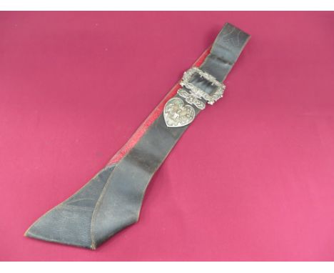 fine black leather cross sash with lower sword frog.  Cast silvered buckle, slider and end tab, all with thistle and rose edg