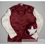 Racing colours of Sheikh Mohammed 1990s, maroon with white sleeves and star on cap, signed by the