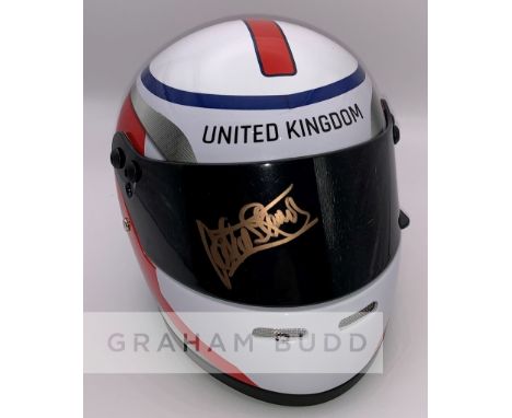 Sir Jackie Stewart (UK) signed half-scale British Grand Prix (Silverstone) F1 helmet, signed on visor in gold marker pen, wit