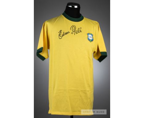 Pele signed yellow Brazil retro jersey, short-sleeved with green collar and C.B.D crest, signed EDSON PELE in black marker pe