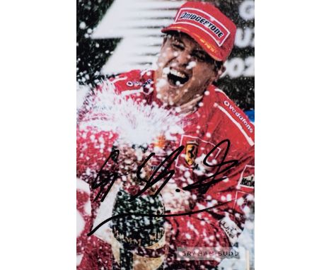 Michael Schumacher 1994 F1 Motor Racing World Champion signed photograph,original 6 by 4in. colour photograph depicting the s