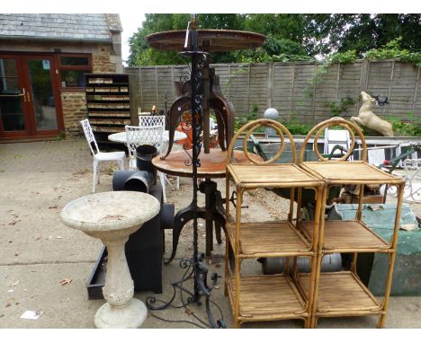 A PAIR OF THREE TIER BAMBOO STANDS, TOGETHER WITH A PAINTED WROUGHT IRON STANDARD LAMP AND A COMPOSITE BIRD BATH