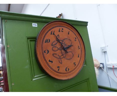 A CELTIC ARTS AND CRAFTS STYLE EMBOSSED LEATHER WALL CLOCK. 