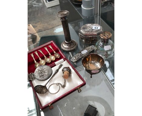 AN EASTERN SILVER LIDDED CASKET, A PART SET OF HALLMARKED SILVER TEA SPOONS, A CONTINENTAL CANDLESTICK, DRESSING TABLE MIRROR