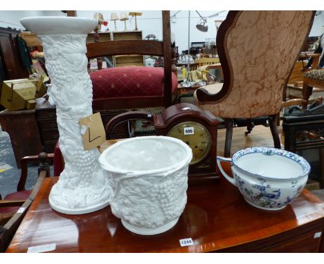 A MAHOGANY CASED MANTLE CLOCK, A PLANTER ON STAND, AND A DECORATIVE ANTIQUE CHAMBER POT. 