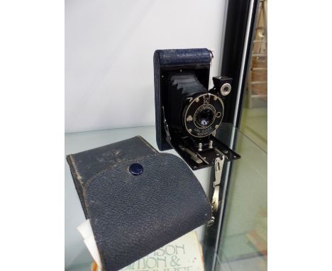 A BLUE LEATHER CASED KODAK GIRL GUIDE CAMERA