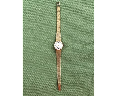 A CONTINENTAL 14ct GOLD LADIES WRIST WATCH BY DRAFA ON A 14ct GOLD BRICK STYLE BRACELET WITH LADDER CLASP. WINDS AND TICKS, N