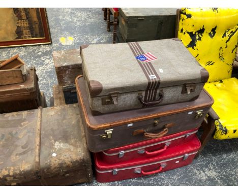 A CANVAS TRUNK TOGETHER WITH FOUR VINTAGE AND LATER SUITCASES